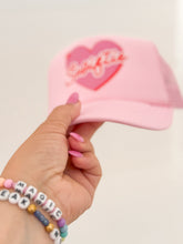 Load image into Gallery viewer, SWIFTIE HEART • trucker hat (adult + youth)